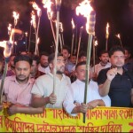 ঢাবি শিক্ষার্থী সাম্য হত্যার বিচারে গাফিলতির প্রতিবাদে রাবিতে মশাল মিছিল